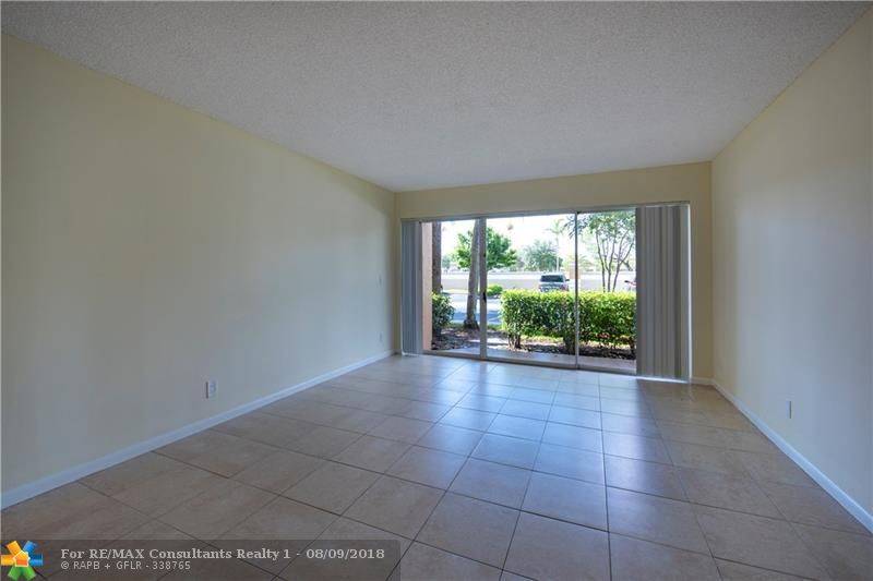 Coral Springs, FL 33067,8977 Wiles Rd  #103