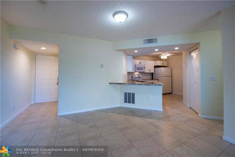 Coral Springs, FL 33067,8977 Wiles Rd  #103