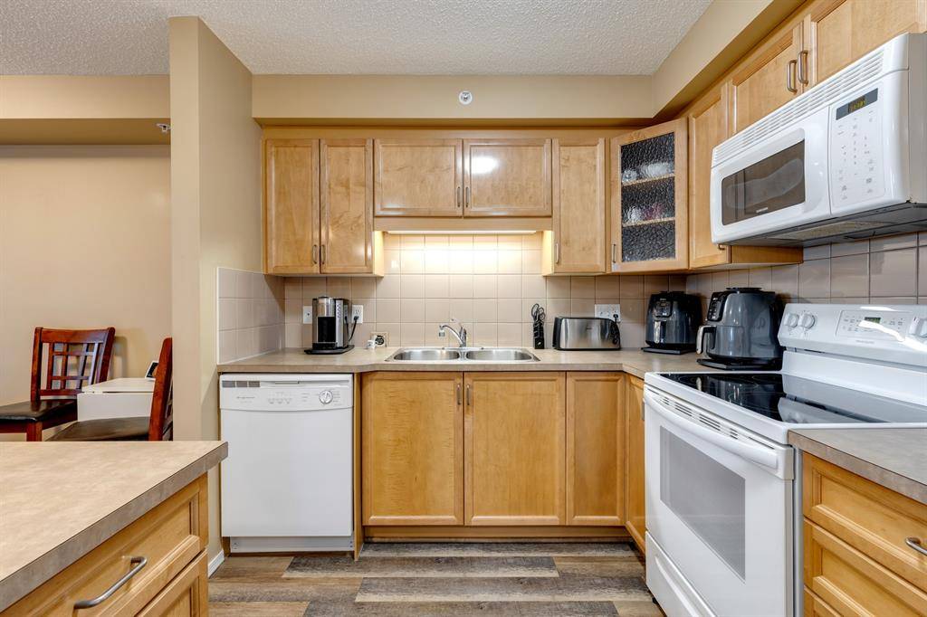 Okotoks, AB T1S 2L2,200 Community WAY #2306