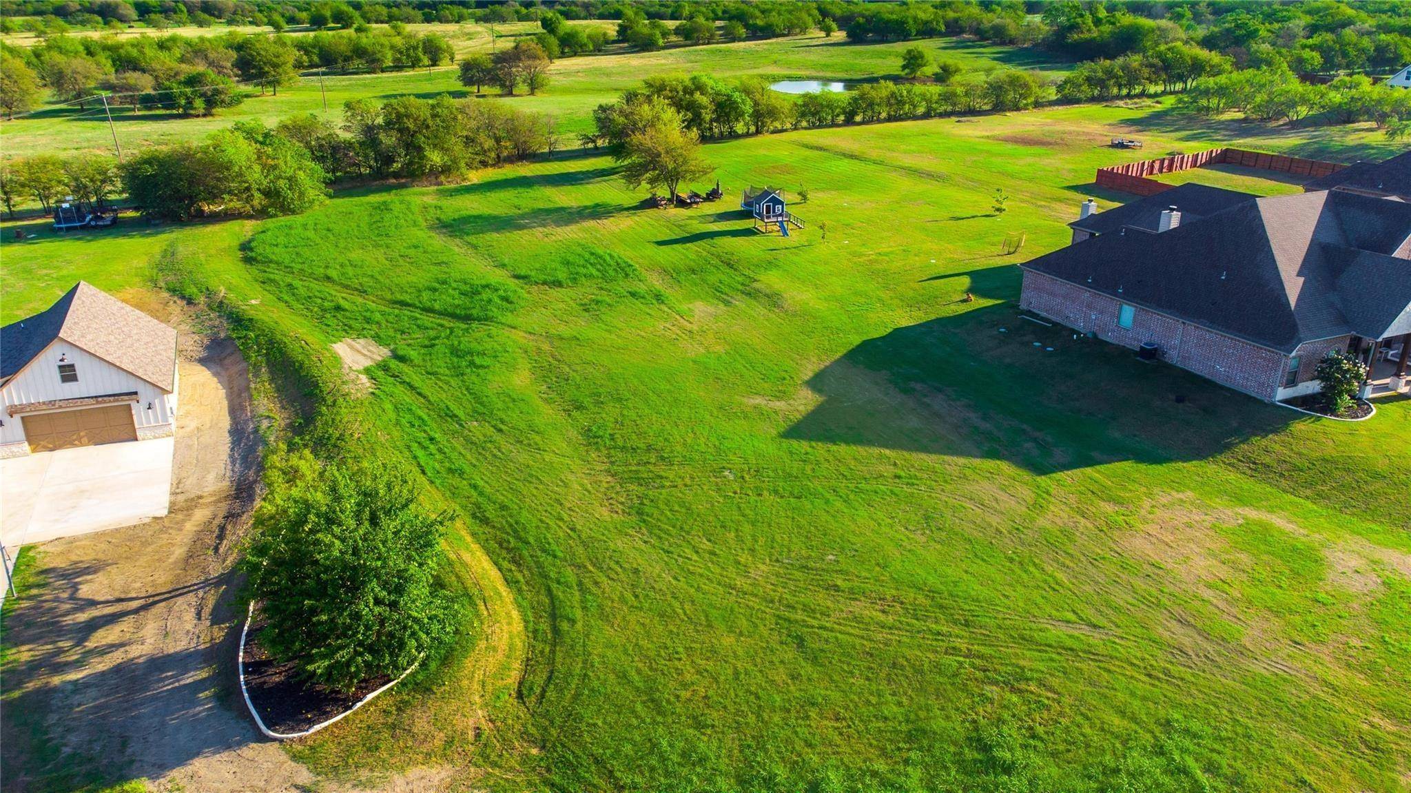 Gunter, TX 75058,112 Whispering Winds Drive