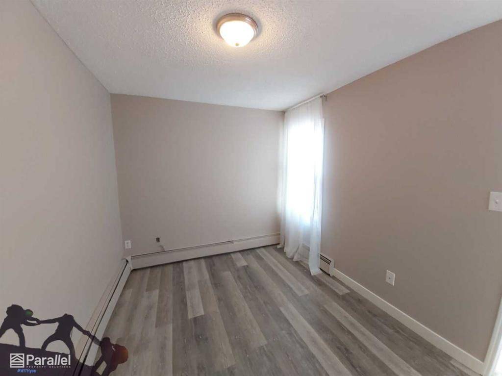 Calgary, AB T3B 2M9,4512 75 ST NW #302