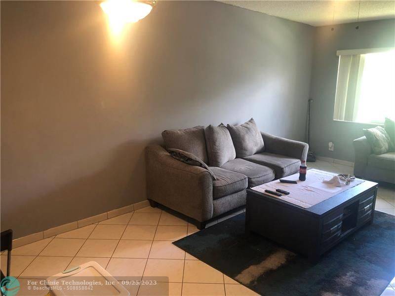 Lauderdale Lakes, FL 33313,5061 W Oakland Park Blvd  #302