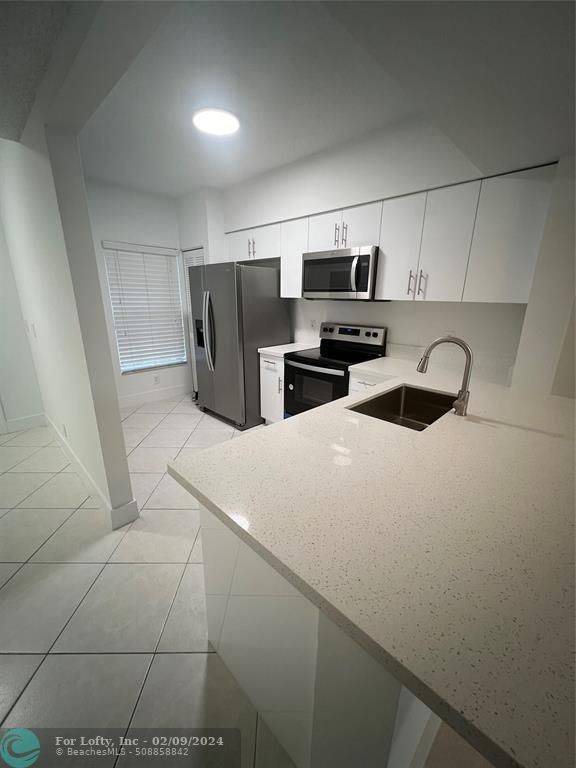 Weston, FL 33326,209 Mallory Ct  #209