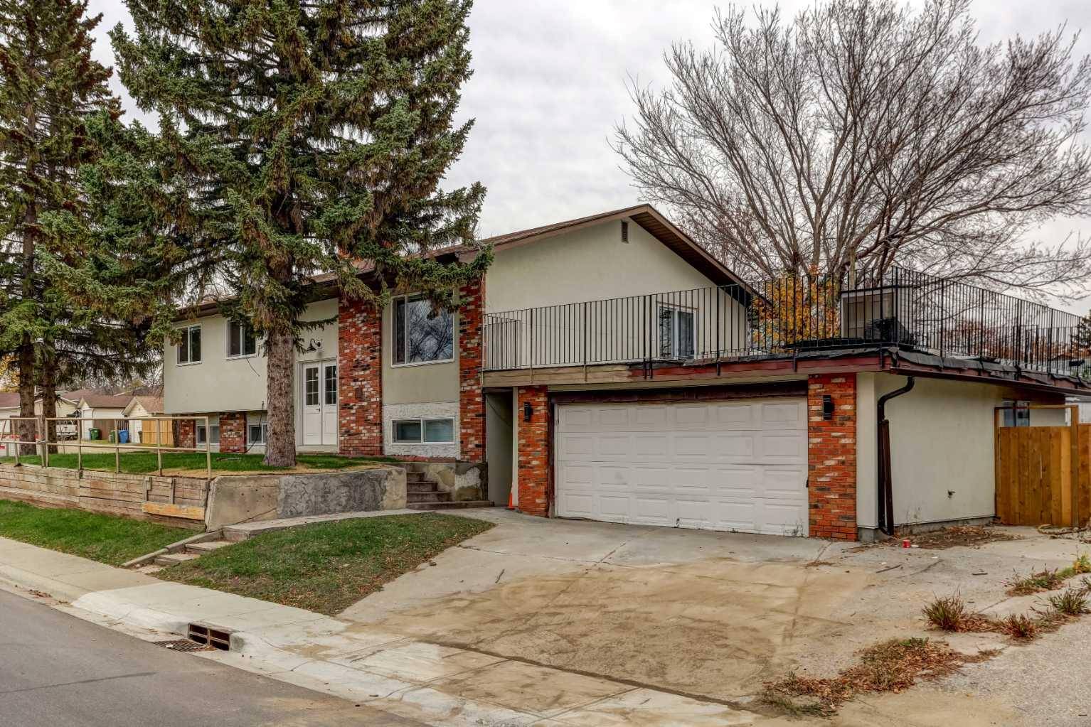 Calgary, AB T1Y1E5,703 Rundleside DR NE