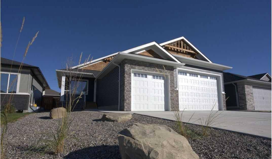 Diamond Valley, AB T0L 0H0,195 Riverwood CRES