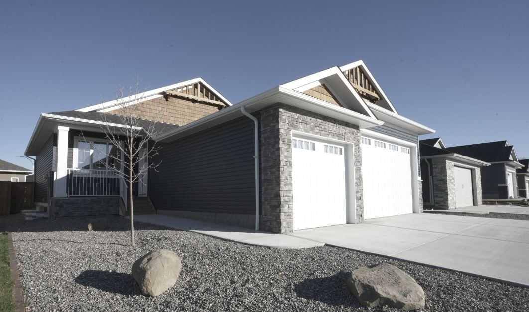 Diamond Valley, AB T0L 0H0,195 Riverwood CRES