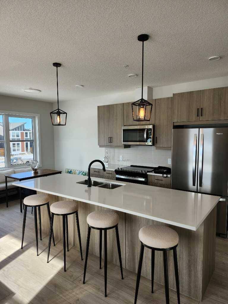 Calgary, AB T2X 5K9,55 Wolf Hollow CRES SE #213