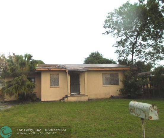 Belle Glade, FL 33430,209 NW 14th St