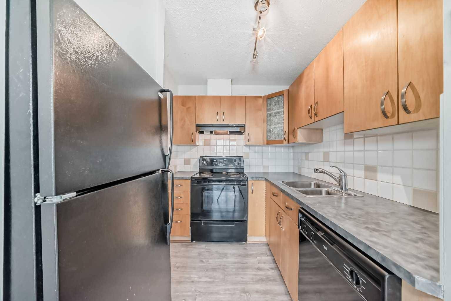 Calgary, AB T2T 4T1,1808 18 ST SW #305