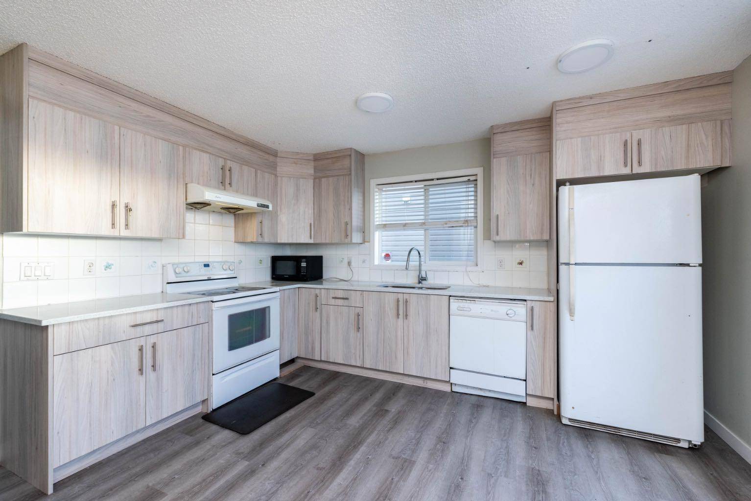 Calgary, AB T3J4L6,228 Martinvalley CRES NE