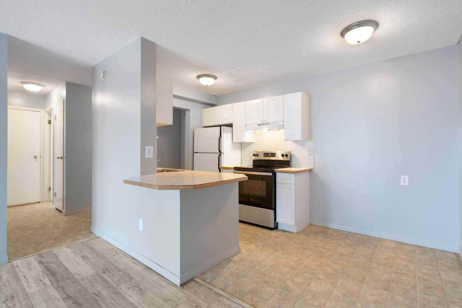 Calgary, AB T3C3N7,1330 15 AVE SW #404