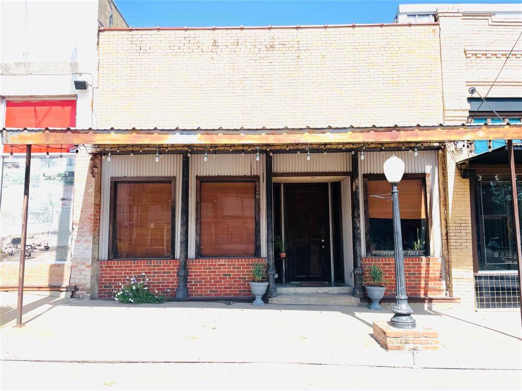 Wolfe City, TX 75496,126 E Main Street