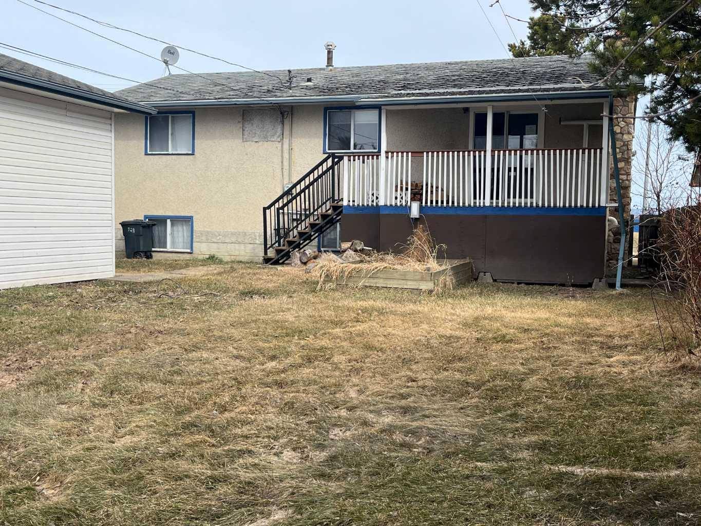 Slave Lake, AB T0G 2A2,721 6 AVE NE