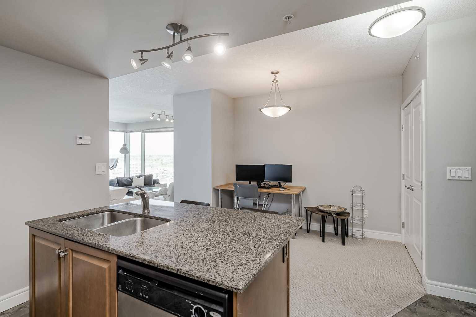 Calgary, AB T2P 0C3,910 5 AVE SW #1402