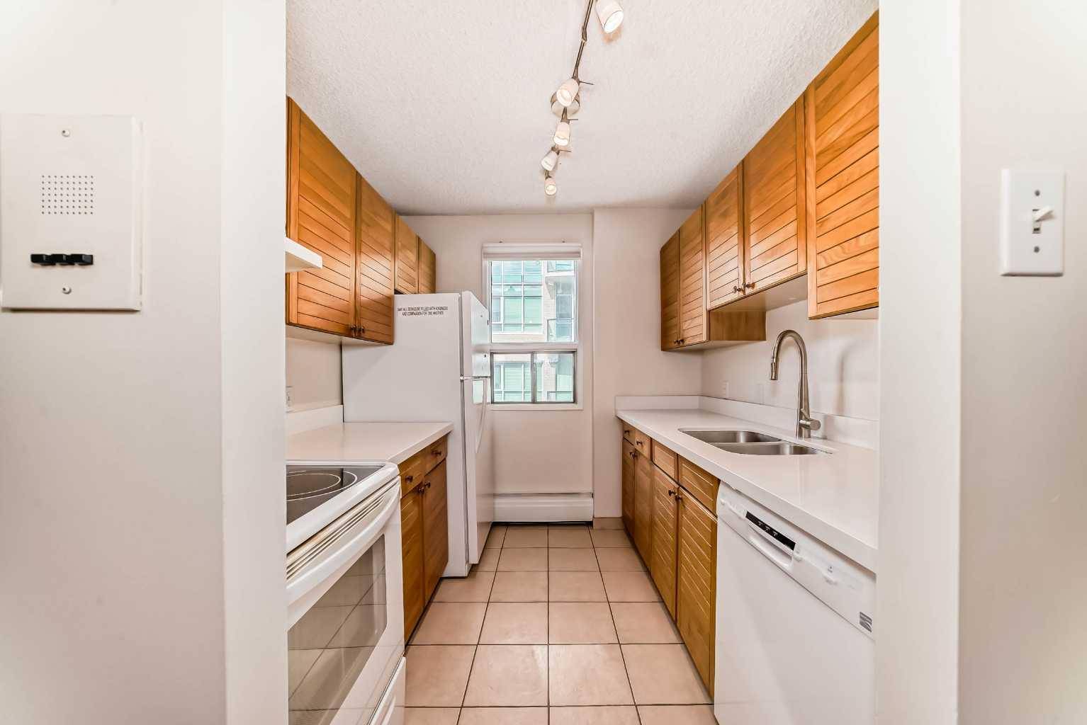 Calgary, AB T2R0H7,718 12 AVE SW #606