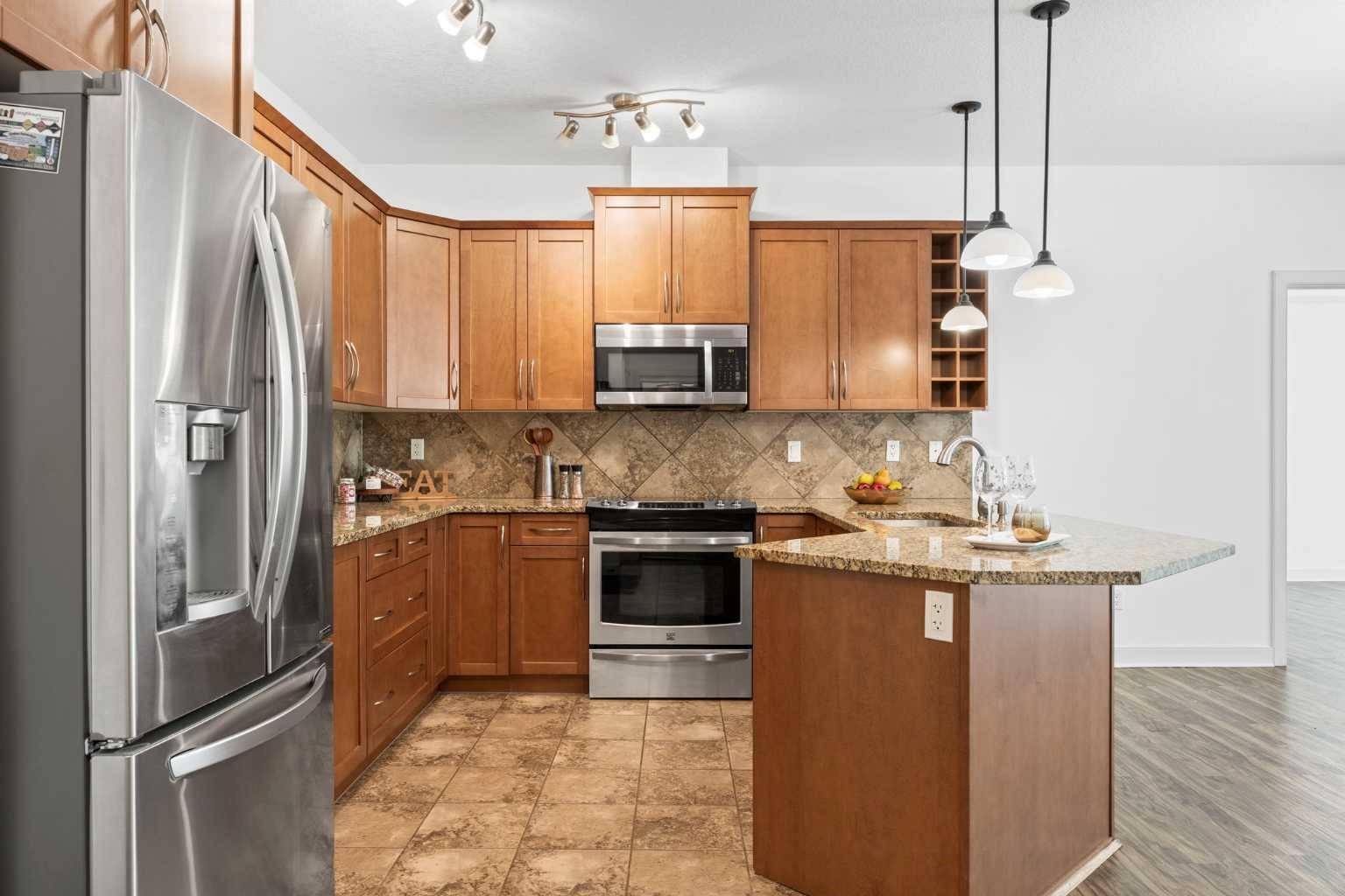 Calgary, AB T3H0E5,35 Aspenmont HTS SW #223