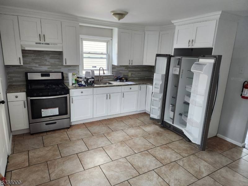 Paterson City, NJ 07514,421-423 E 27Th St