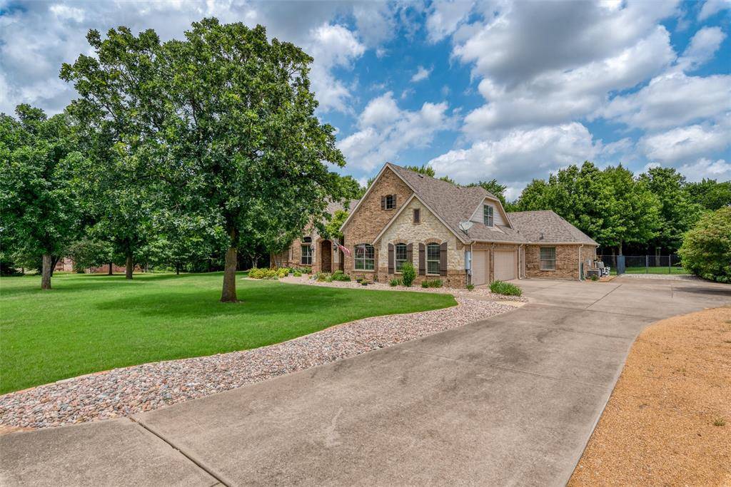 Gunter, TX 75058,136 Whispering Winds Drive