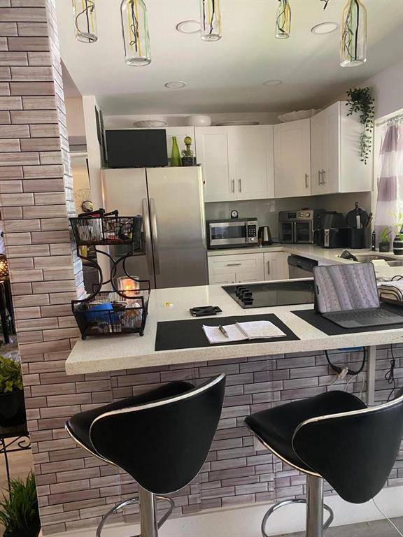 Tamarac, FL 33321,9091 Lime Bay #304