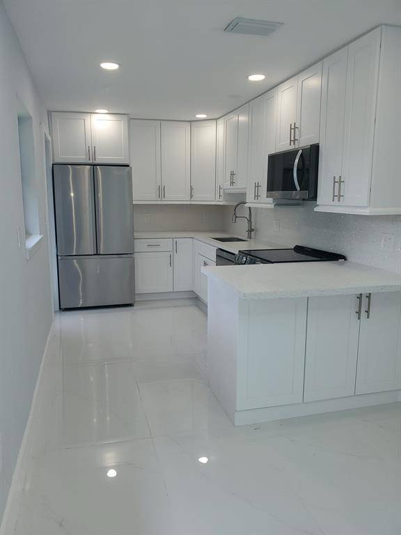 North Miami Beach, FL 33162,440 NE 174th St