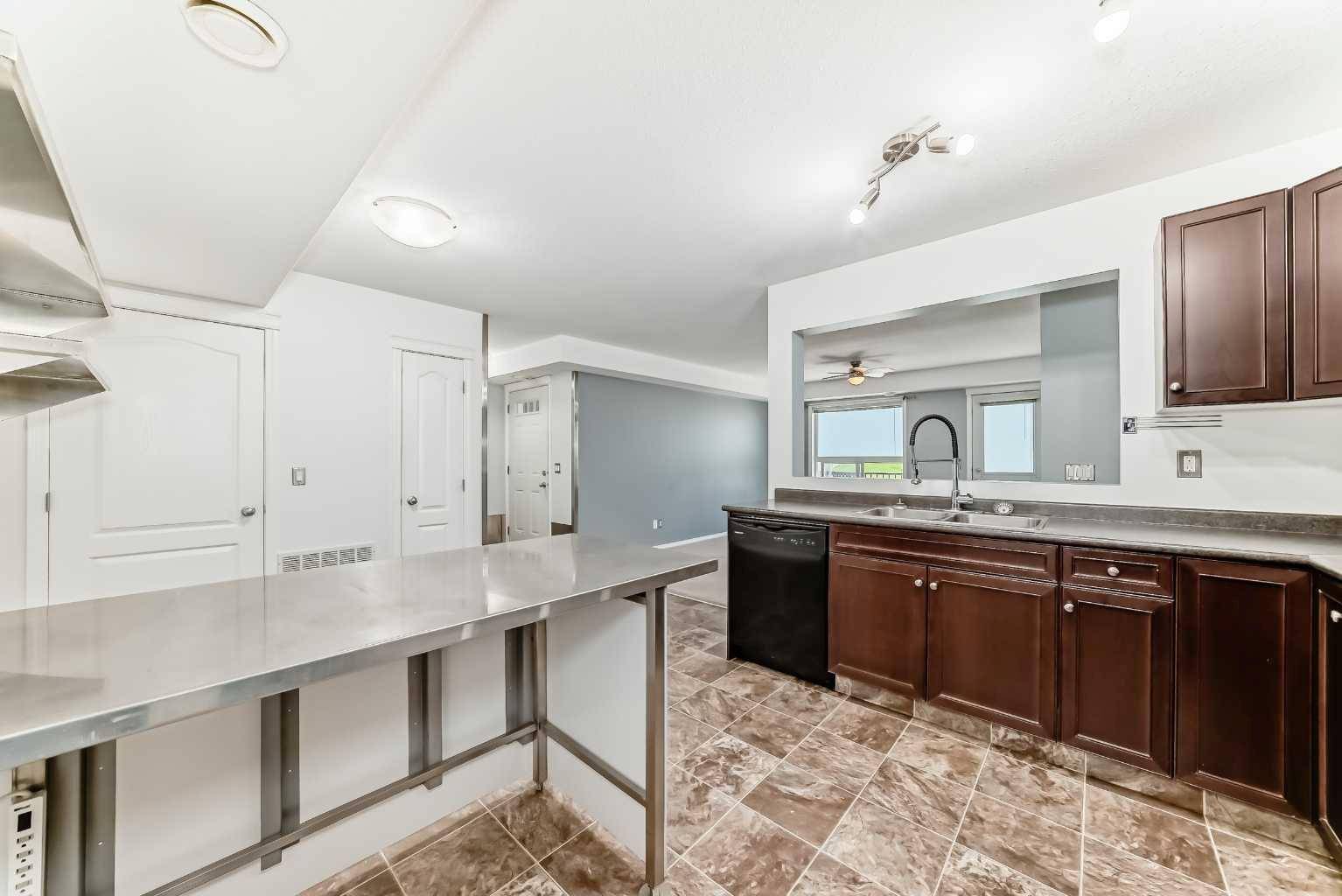 Strathmore, AB T1P0E1,8 Bayside PL #206