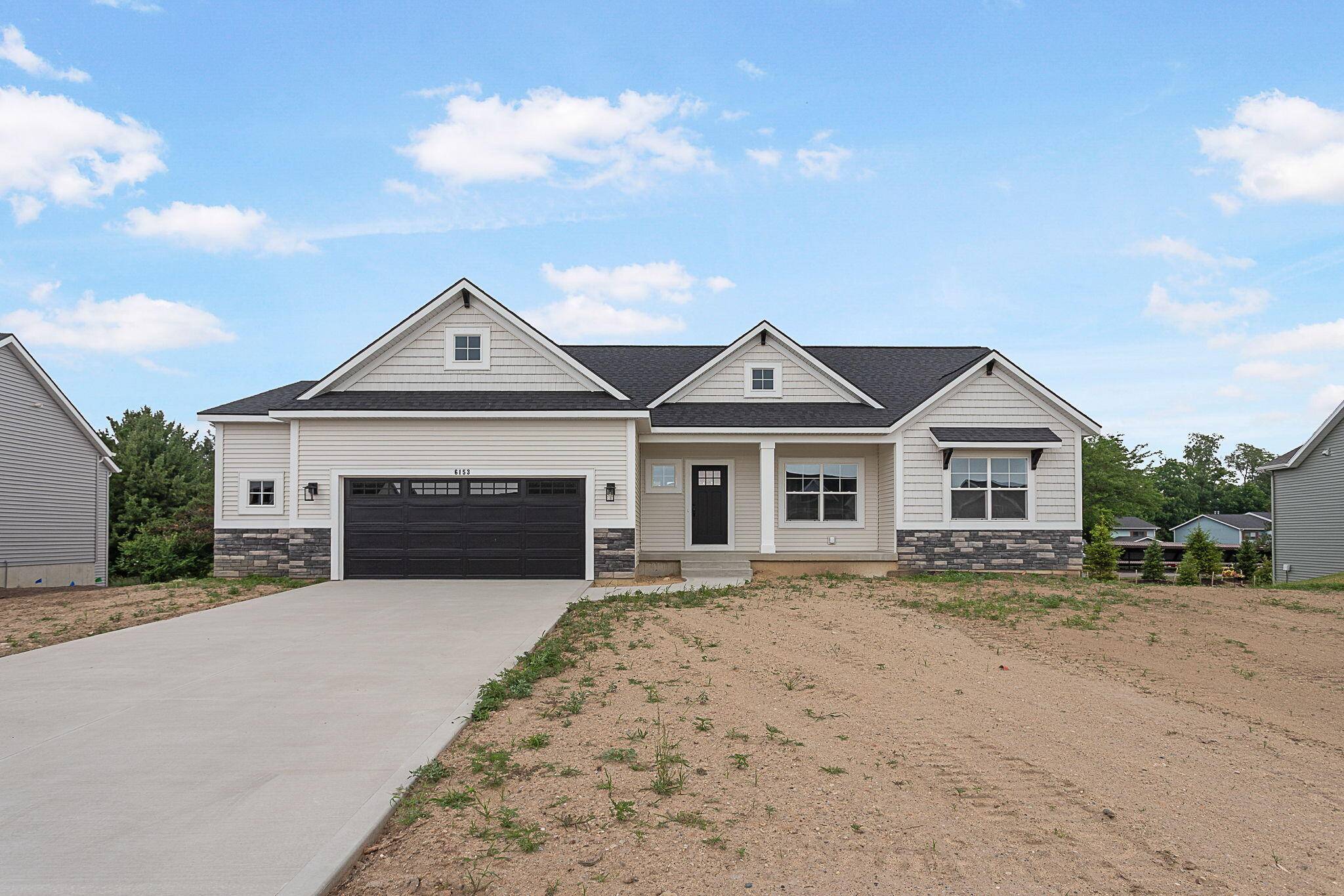 Holland, MI 49423,6153 Lake Wind AVE