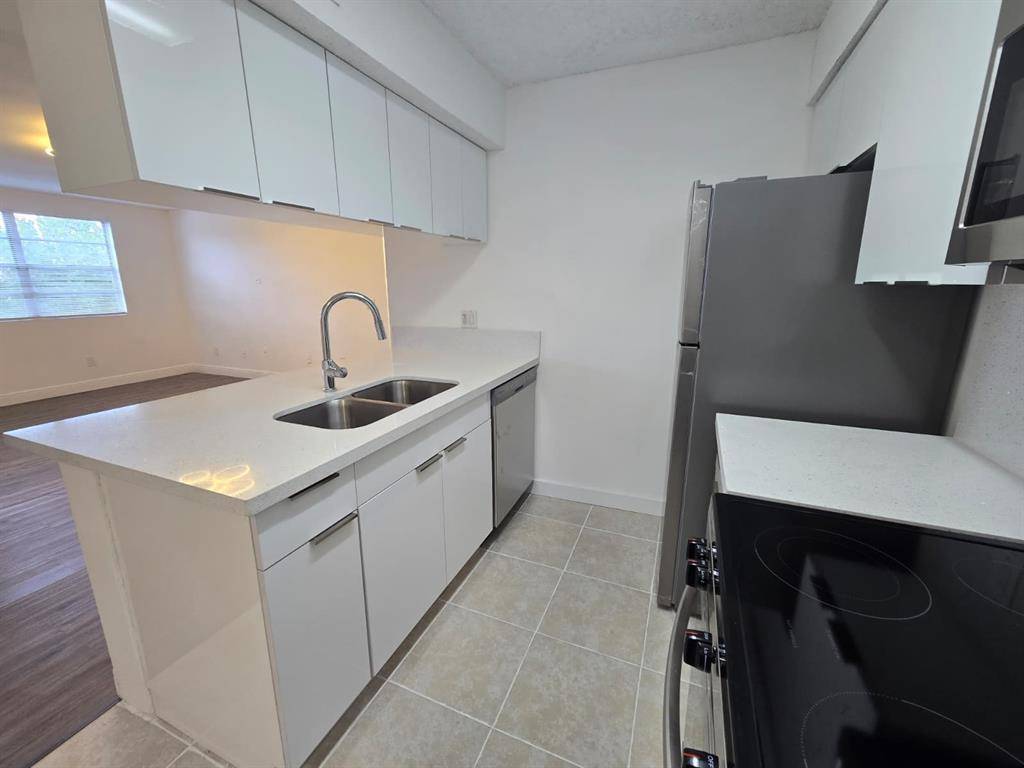 Pompano Beach, FL 33069,1241 SW 46th Ave #1002