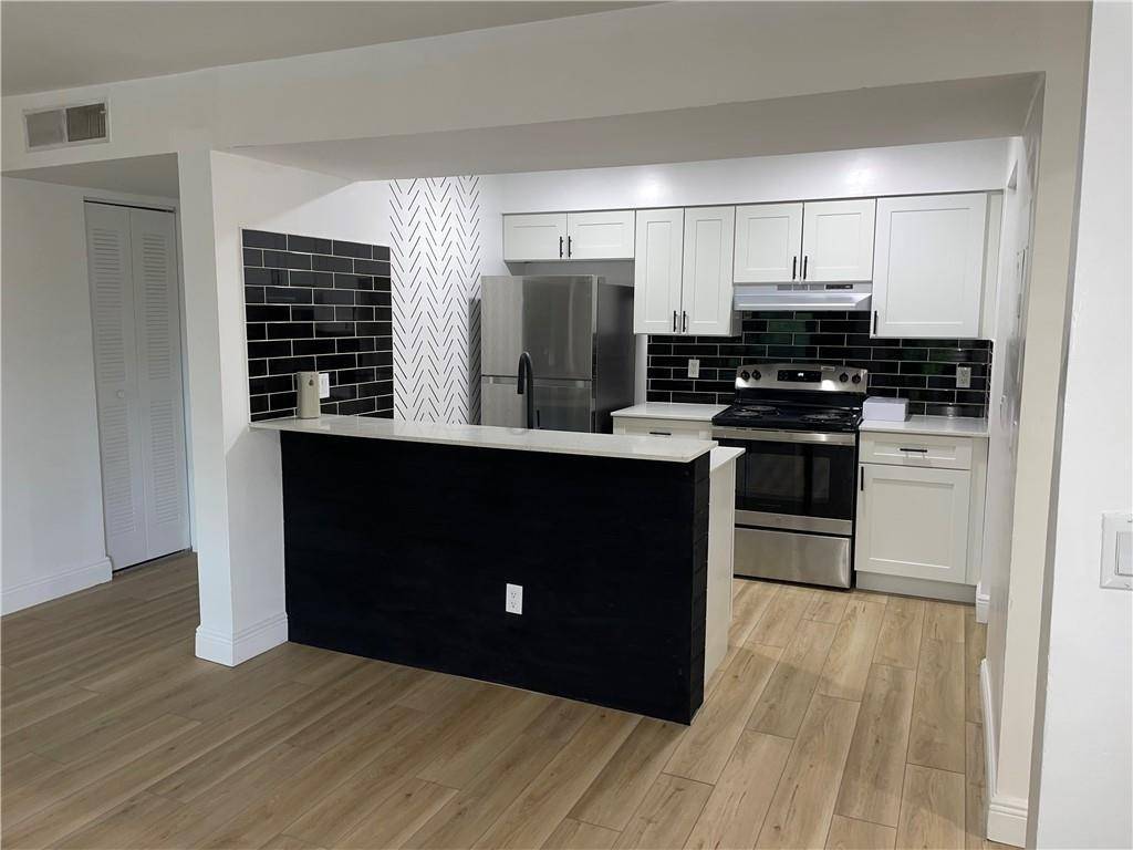 Pompano Beach, FL 33069,1223 SW 46th Ave #108