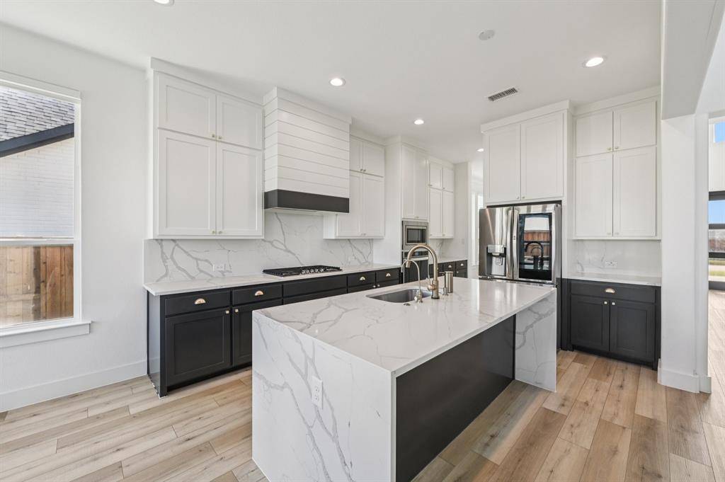 Prosper, TX 75078,580 Falling Leaves Drive