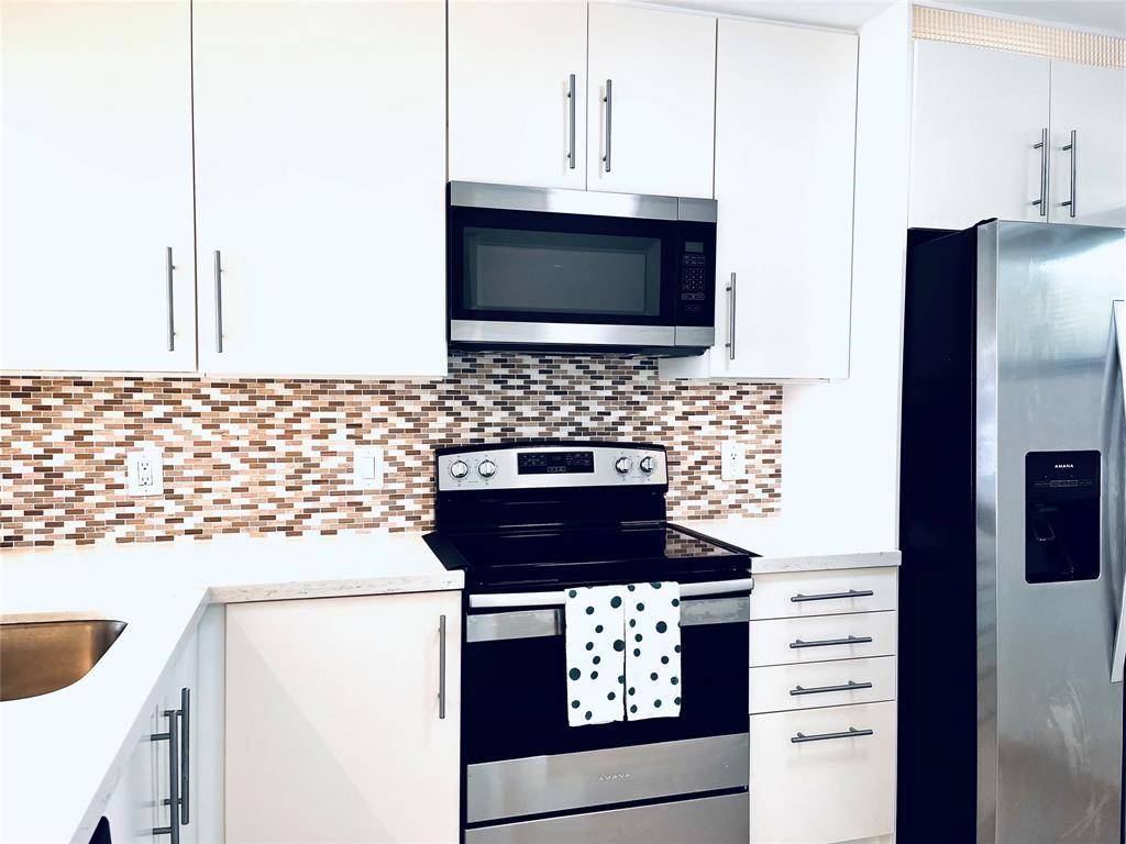 Oakland Park, FL 33309,112 Lake Emerald Dr #107