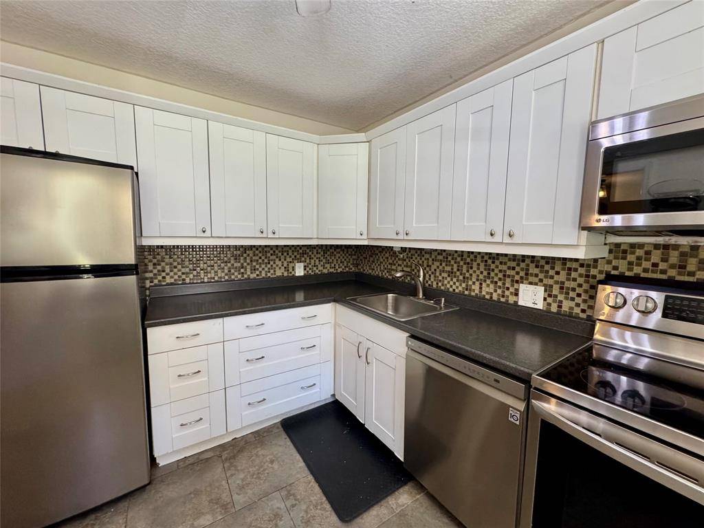 Pompano Beach, FL 33069,2601 S Course Dr #305