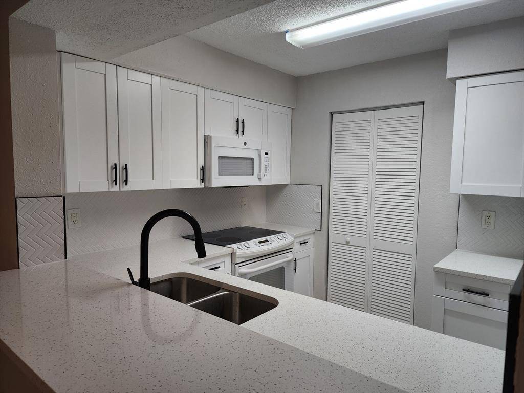 Pompano Beach, FL 33069,1229 SW 46th Ave #405