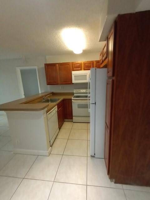 Coconut Creek, FL 33063,941 Lyons Rd #5-105
