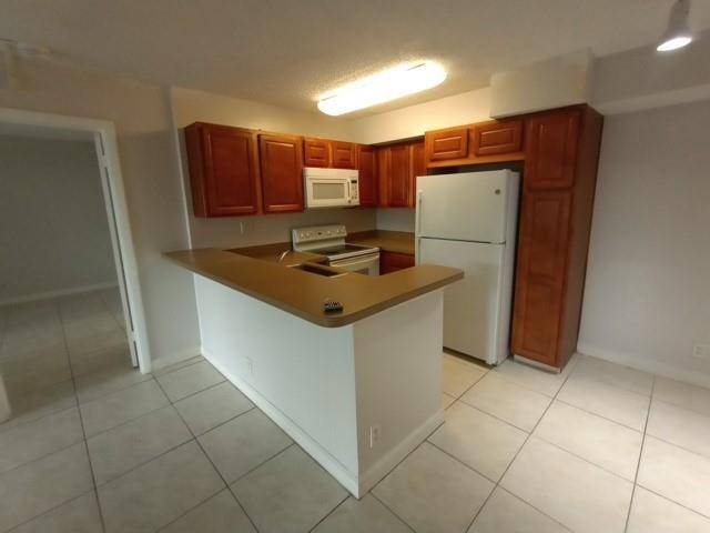 Coconut Creek, FL 33063,941 Lyons Rd #5-105