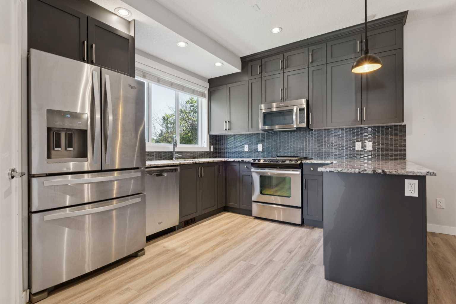 Calgary, AB T3B 0A9,4513 Bowness RD NW #1