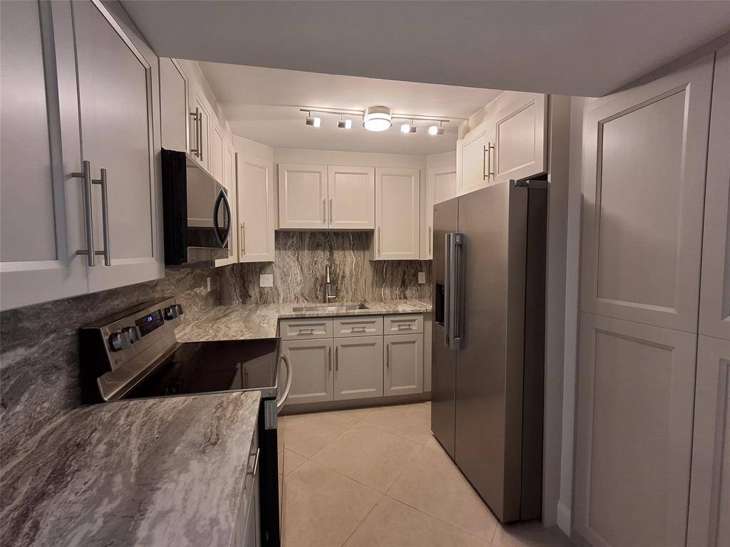 Coral Springs, FL 33071,8763 Shadow Wood Blvd #202