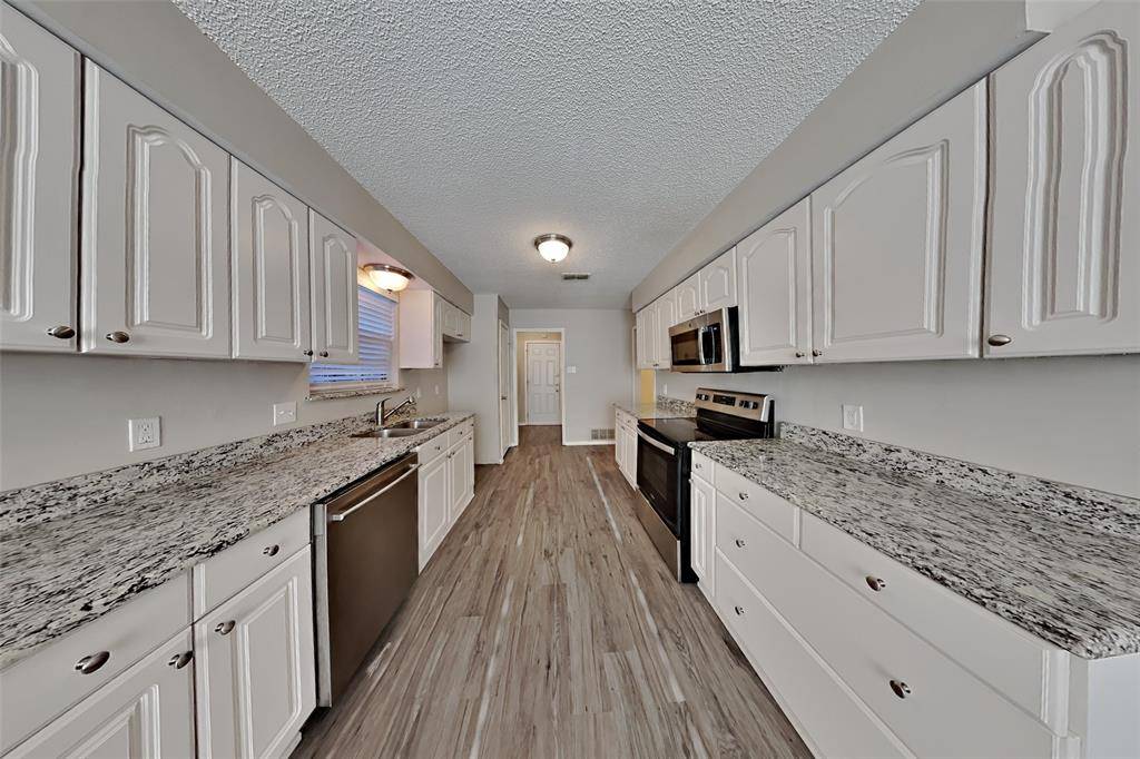 Rowlett, TX 75089,7802 Creek Wood Drive