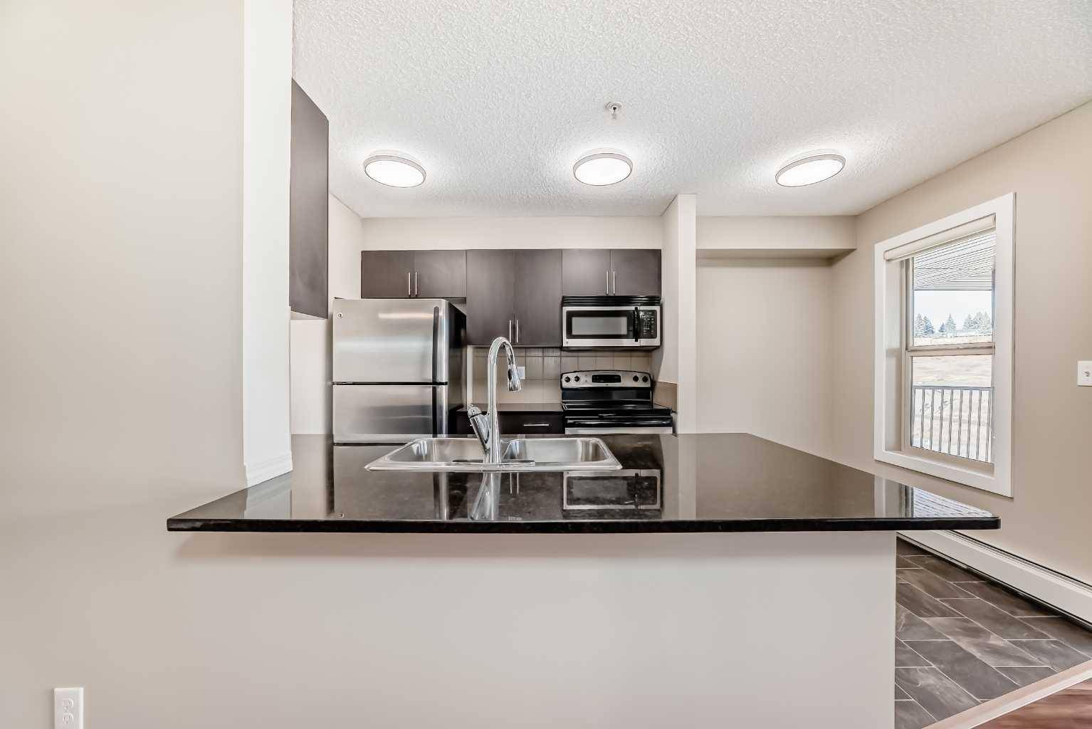 Cochrane, AB T4C 0S7,625 Glenbow DR #1402