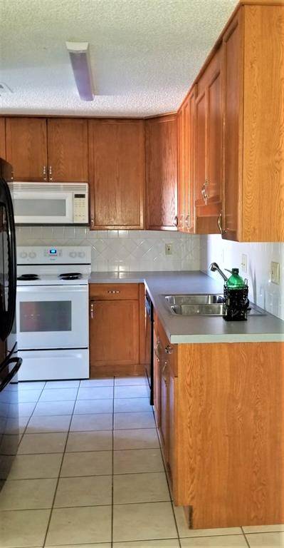 2200 E Trinity Mills Road #403, Carrollton, TX 75006