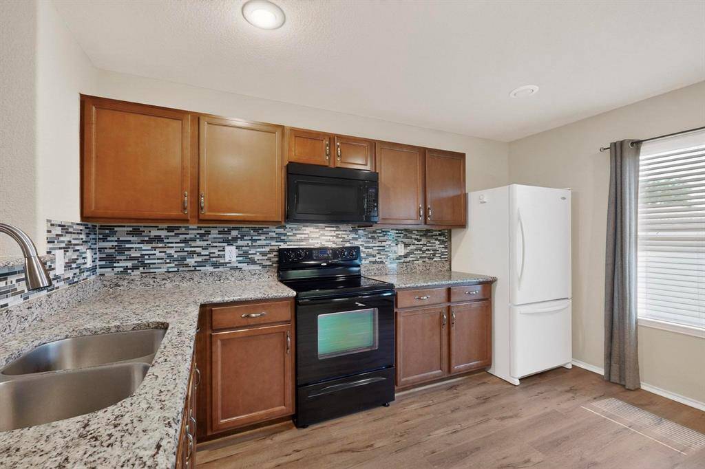 313 Coneflower Drive, Fate, TX 75087