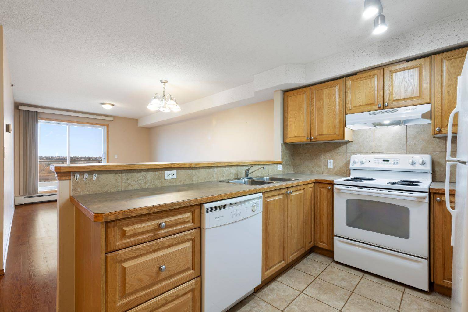 92 Saddletree CT NE #311, Calgary, AB T3J 0K9