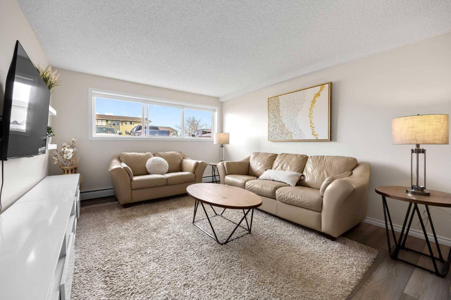 101 Big Hill WAY SE #215, Airdrie, AB T4A 1Z7