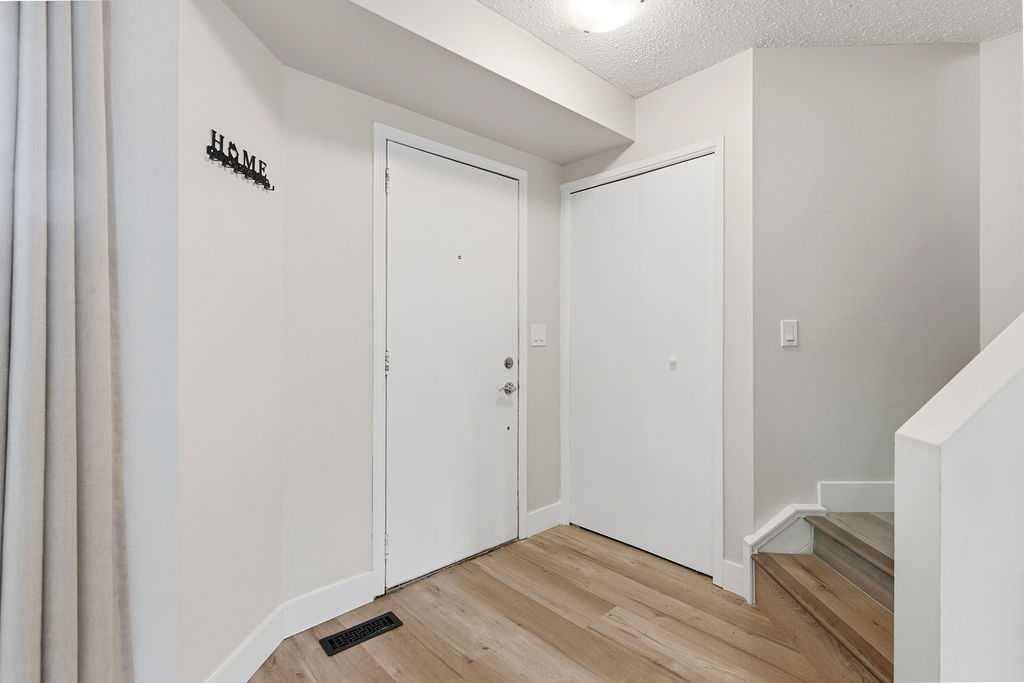 123 Queensland DR SE #102, Calgary, AB T2J 5J4