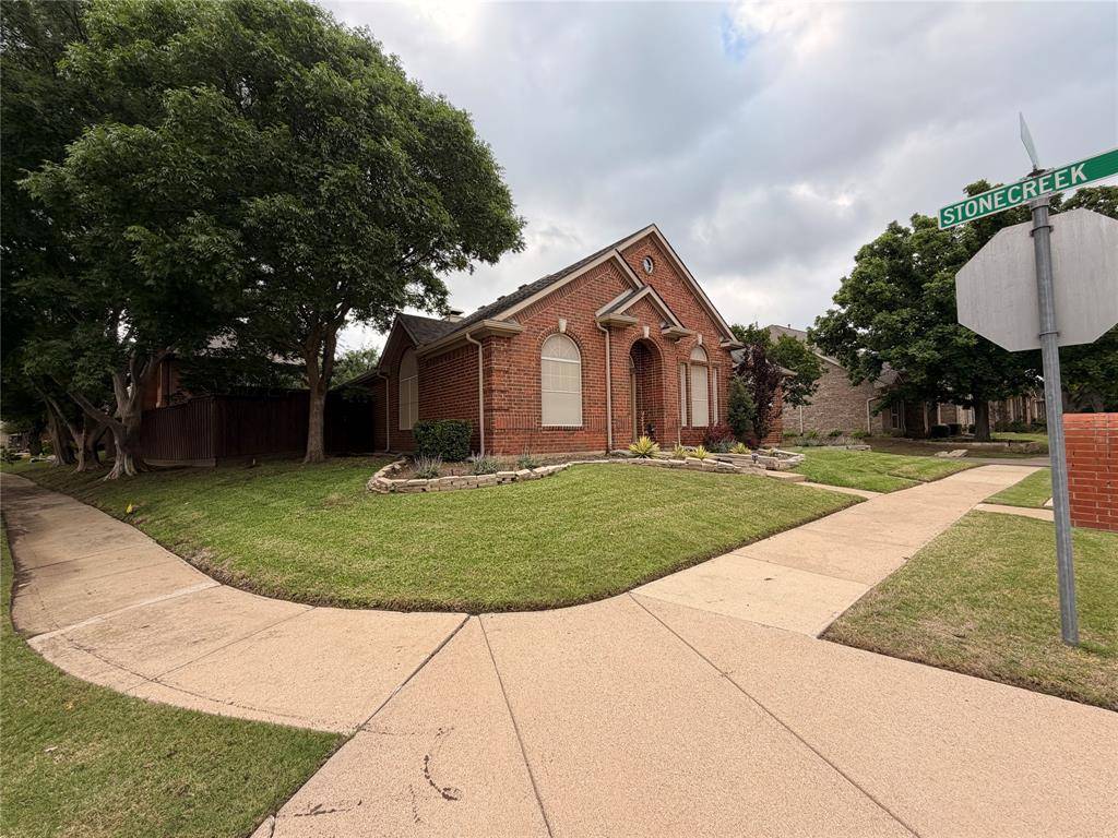 8640 Woodcreek Drive, Irving, TX 75063