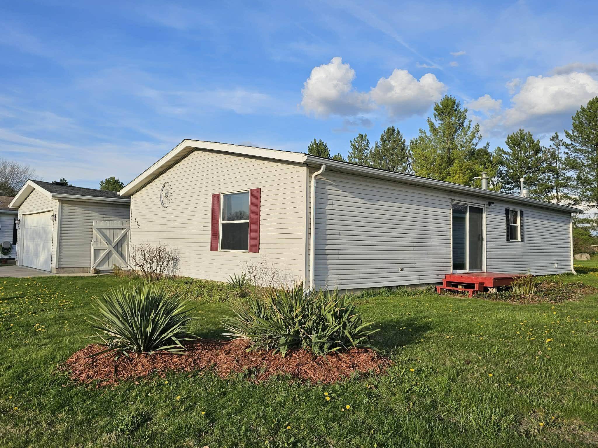 229 Cadgewith E, Dewitt Twp, MI 48906