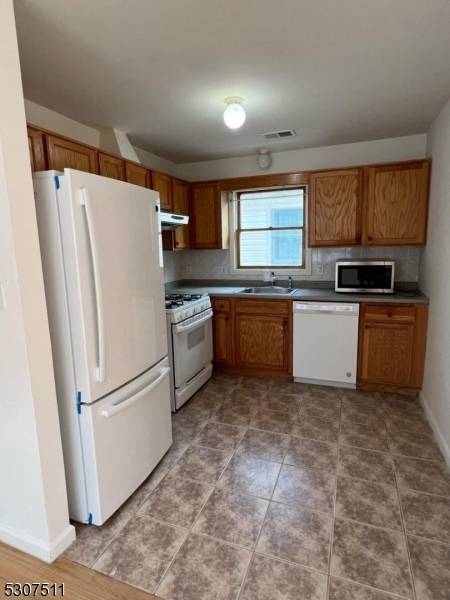 110 S 3rd St, Harrison Town, NJ 07029