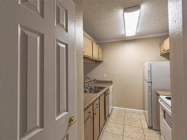 2200 E Trinity Mills Road #312, Carrollton, TX 75006
