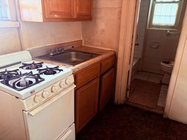 997 East 37th ST, Brooklyn, NY 11210