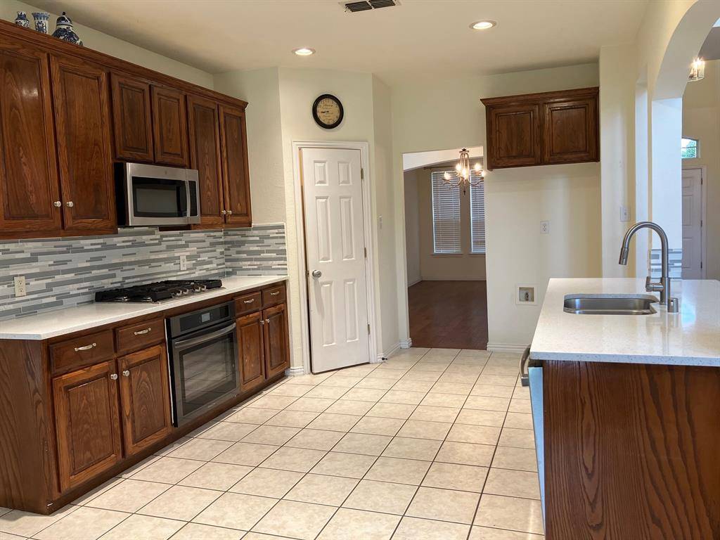 2616 Quail Hollow Drive, Sachse, TX 75048