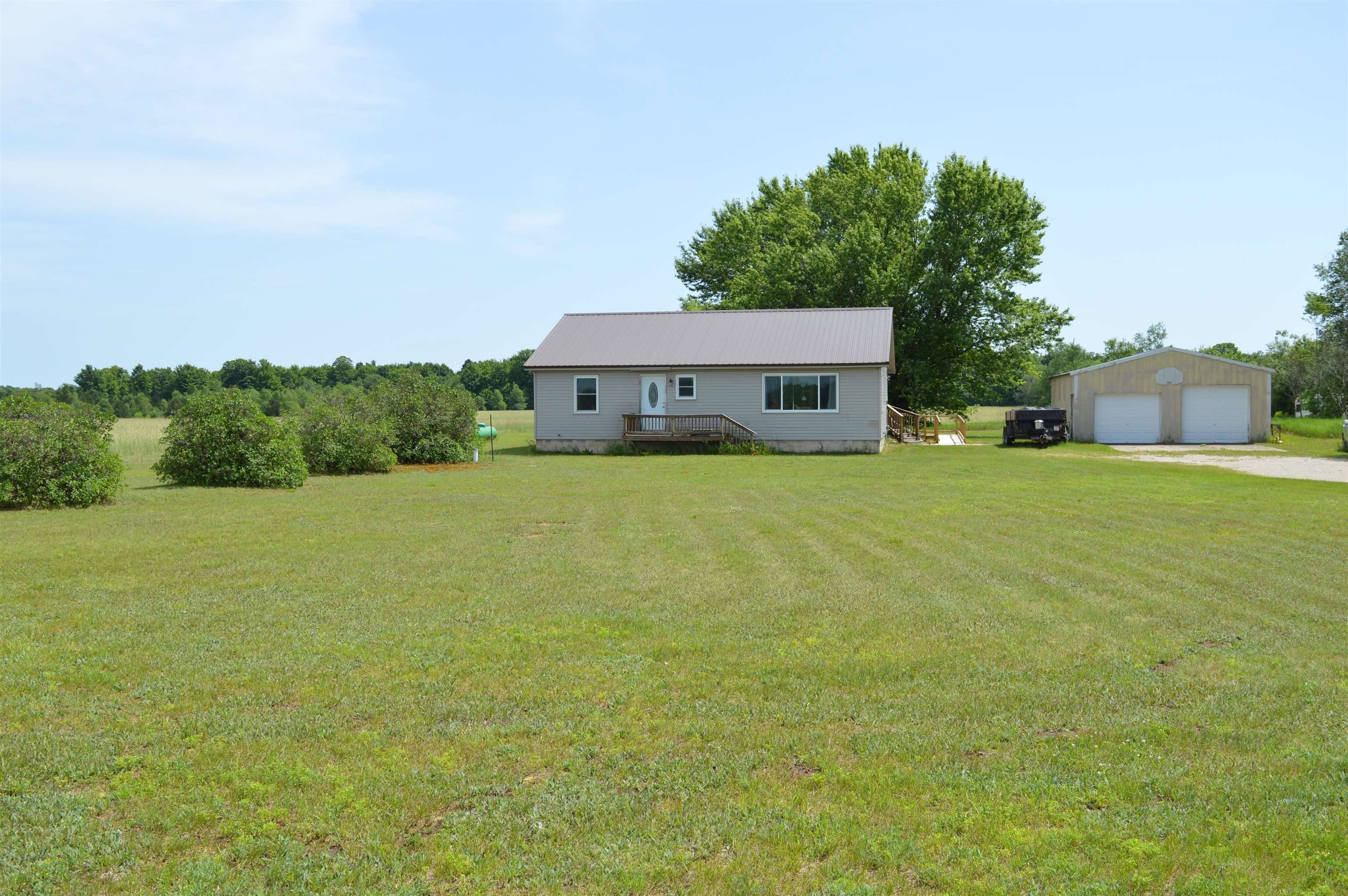 6268 E M-72, Excelsior Twp, MI 49646